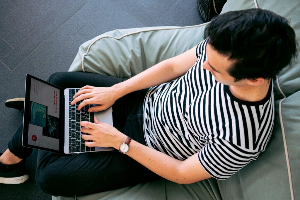 photo of man using laptop build a website that ranks on google